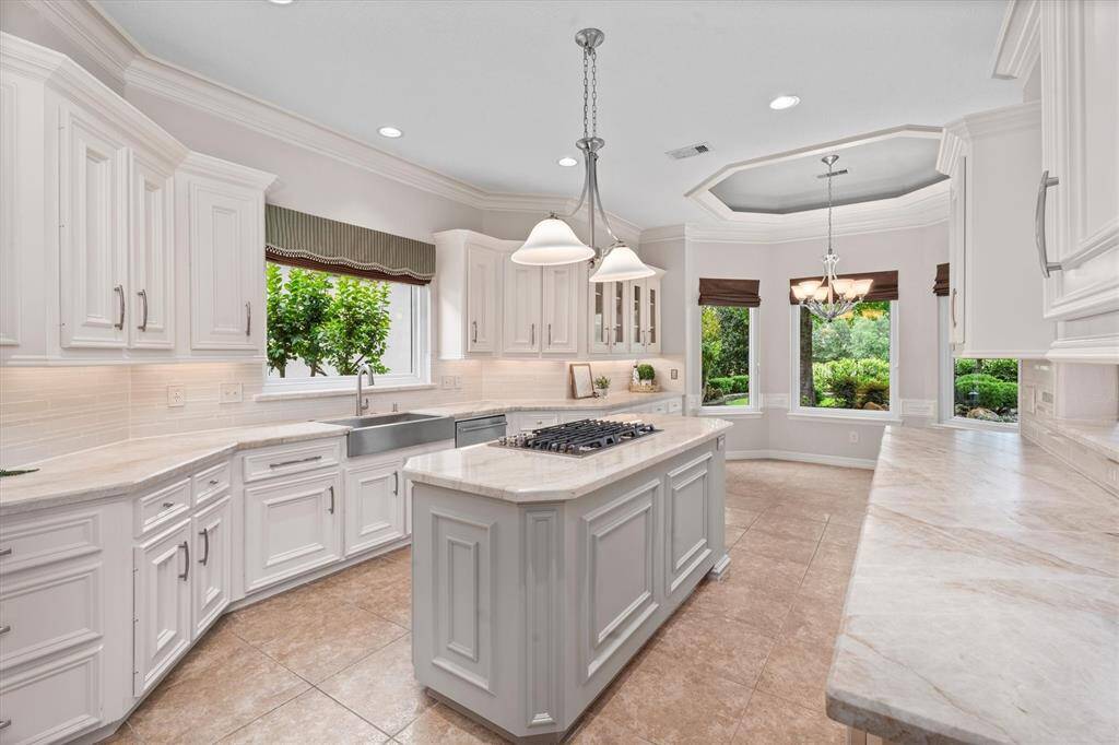 Taj Mahal countertops with leather finish.