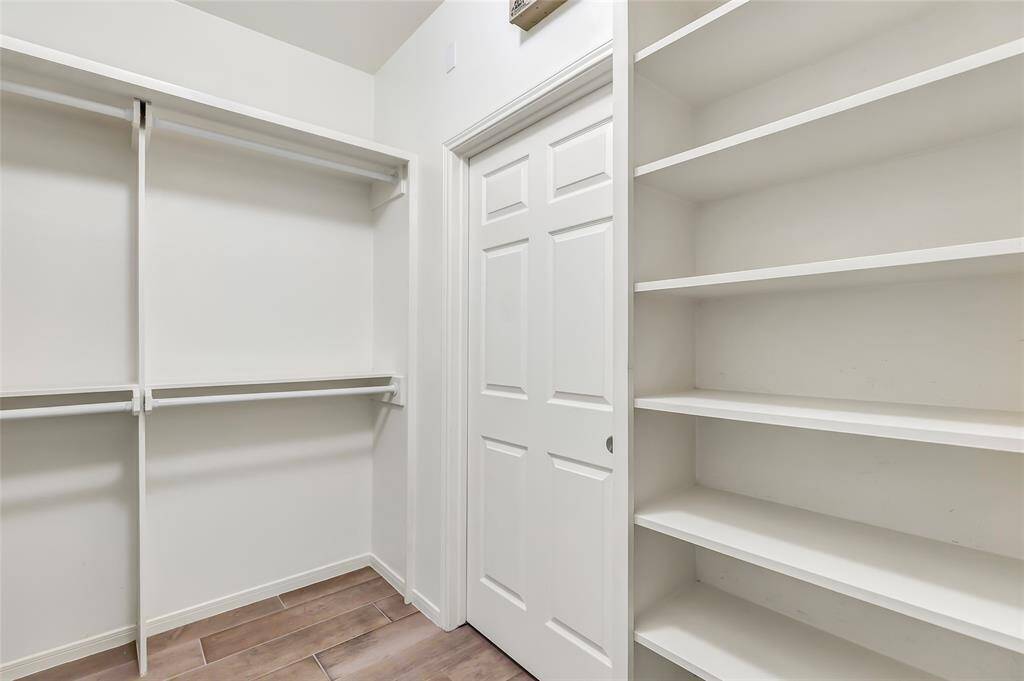 Thoughtfully planned storage solutions, including ample cabinetry and counter space, keep everything organized and within reach.