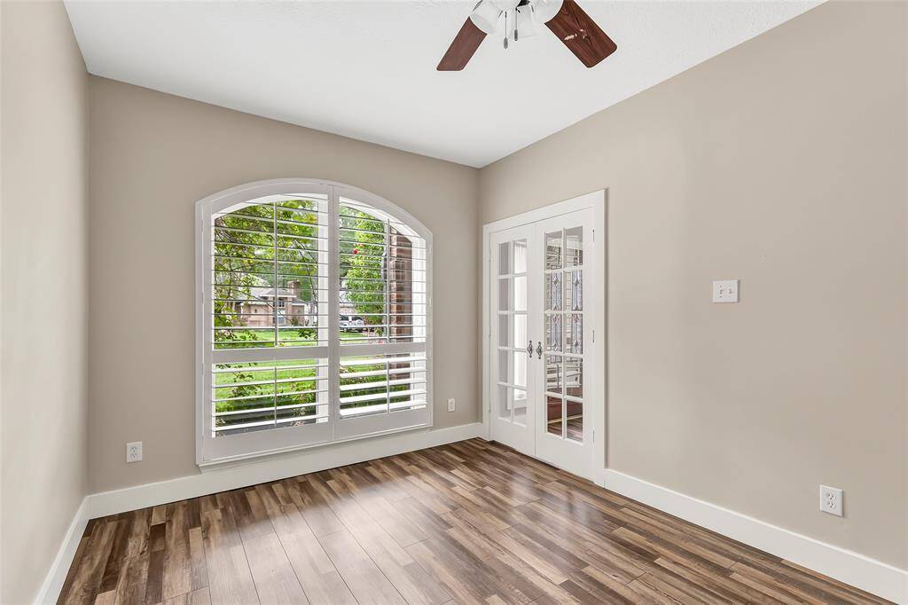 Large windows fill the room with natural light, creating a bright and inviting atmosphere. With ample space for seating, gaming consoles, or a pool table, this area is ideal for creating memories and enjoying downtime.