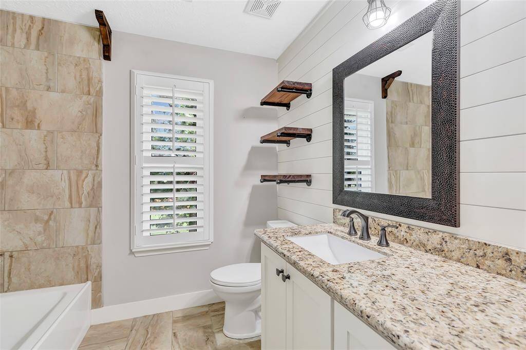These three generously sized secondary bedrooms offer flexibility and comfort for family members, guests, or even a secondary home office.