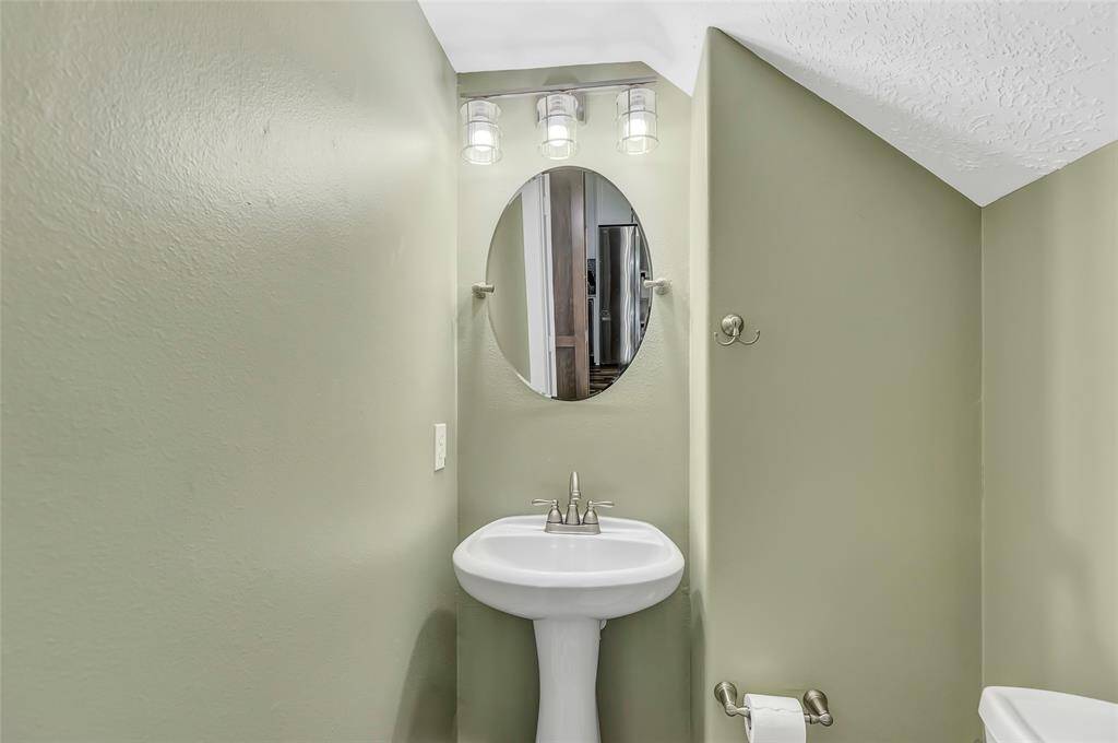 With easy access to everything you need and plenty of room to move around, this laundry room adds both practicality and efficiency to your home.