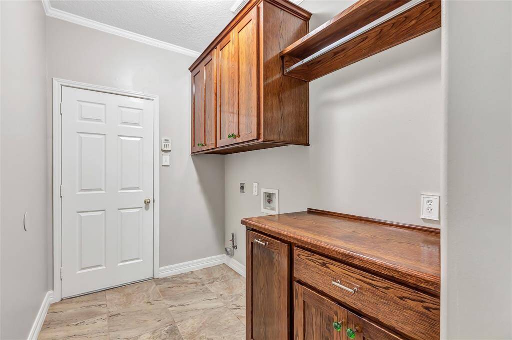 This well-designed two-car garage offers ample space for both vehicles and storage.