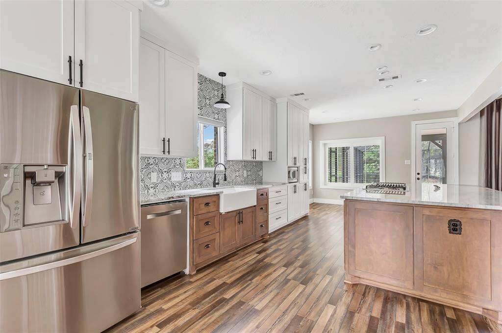 Step inside to discover a bright and open floor plan featuring spacious living areas, high ceilings, and stylish finishes throughout.