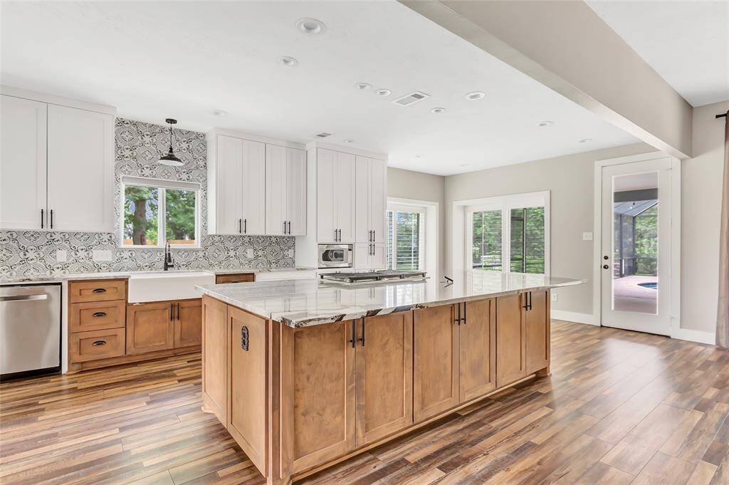 Designed for both style and function, this spacious formal dining room is perfect for hosting memorable dinners and special gatherings