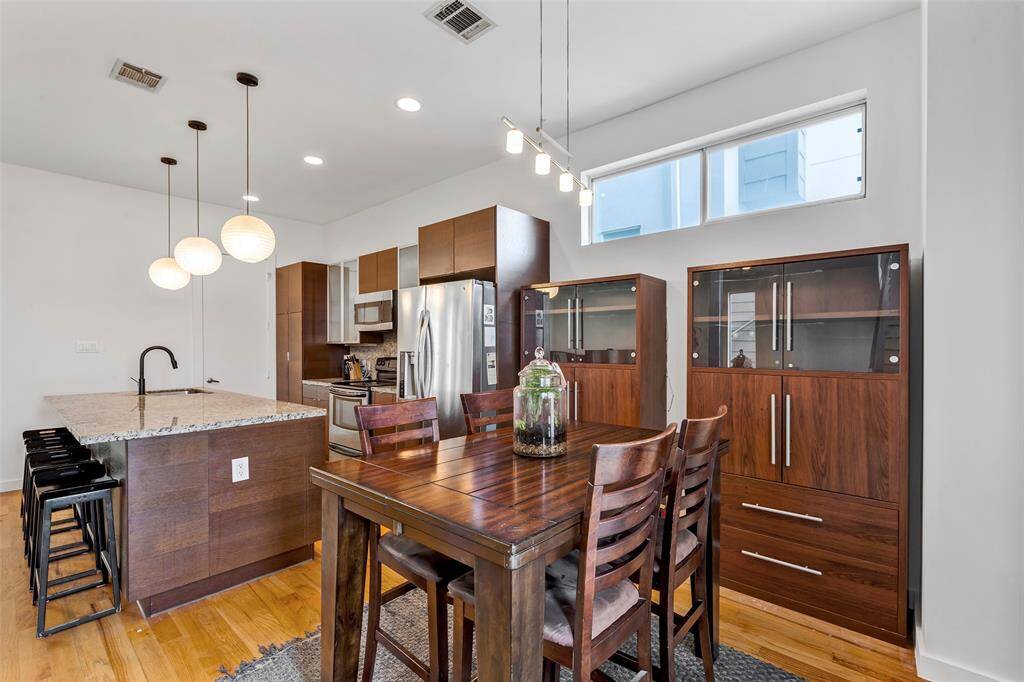 Cozy dining area located just beside the kitchen, offering the perfect space for family meals.