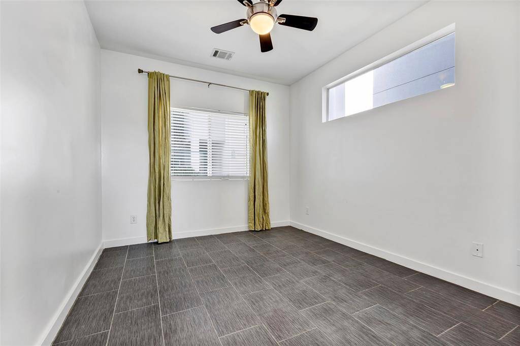 This bedroom is an empty canvas awaiting your personal touch – transform this bedroom into the sanctuary of your dreams.