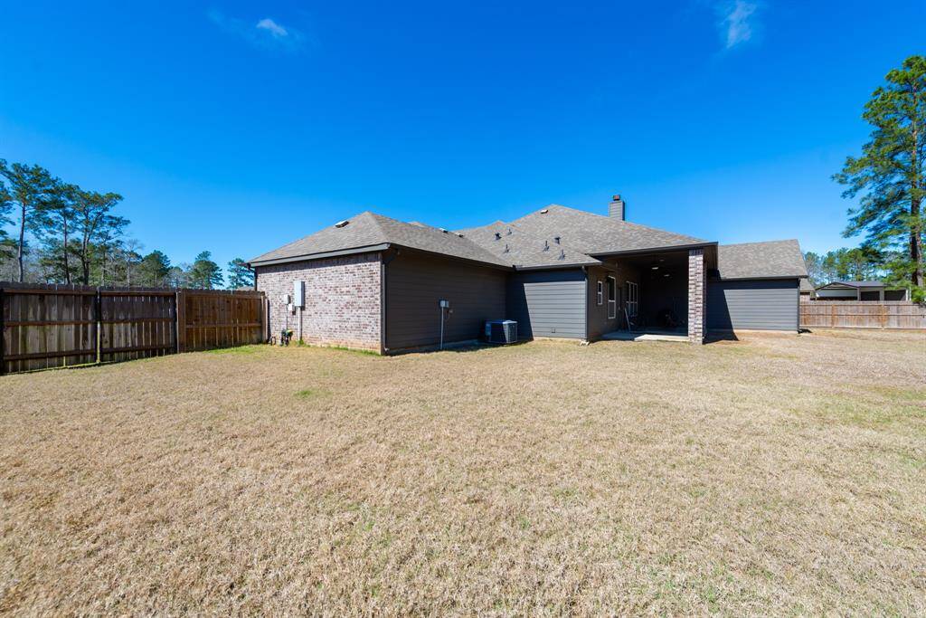 The backyard is a true highlight, offering plenty of room to create your dream outdoor space.
