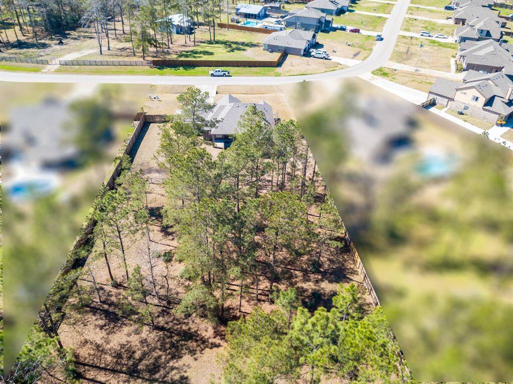 Aerial views highlight the impressive size of the property, showcasing its peaceful setting.