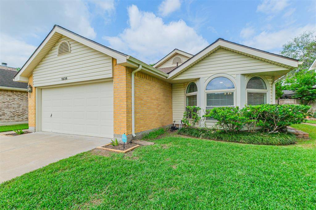You will love the curb appeal on this classic ranch style home
