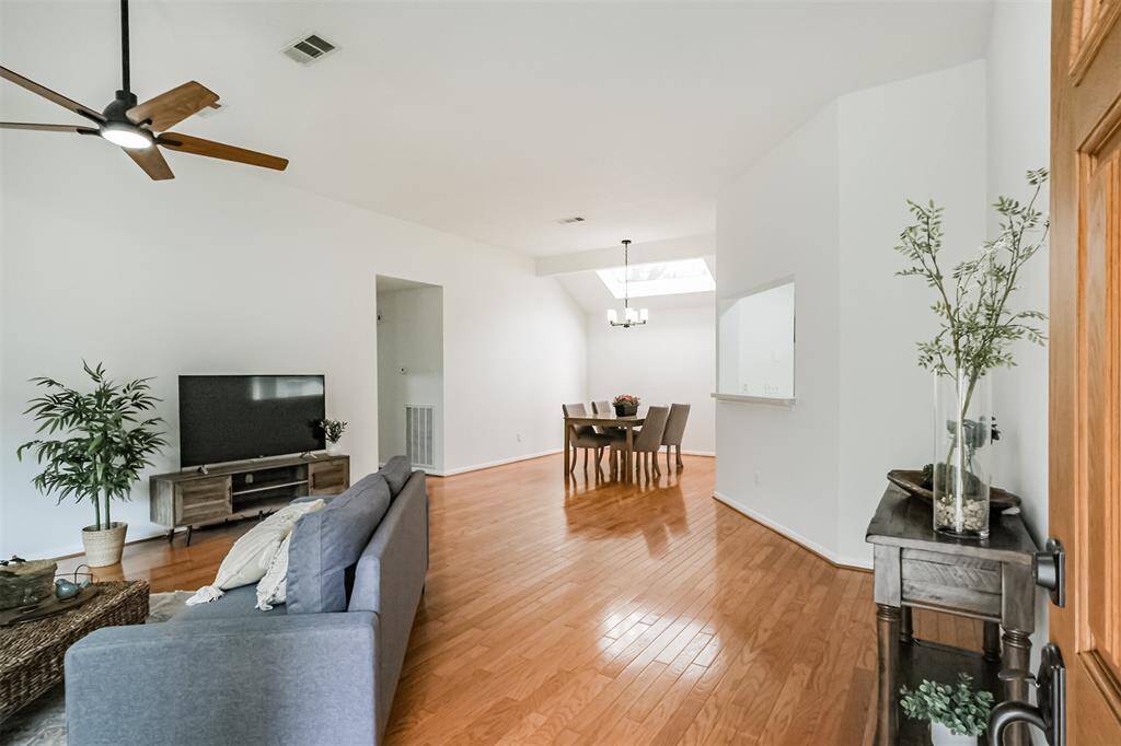 The gorgeous wood floors give a nod to mid century modern design