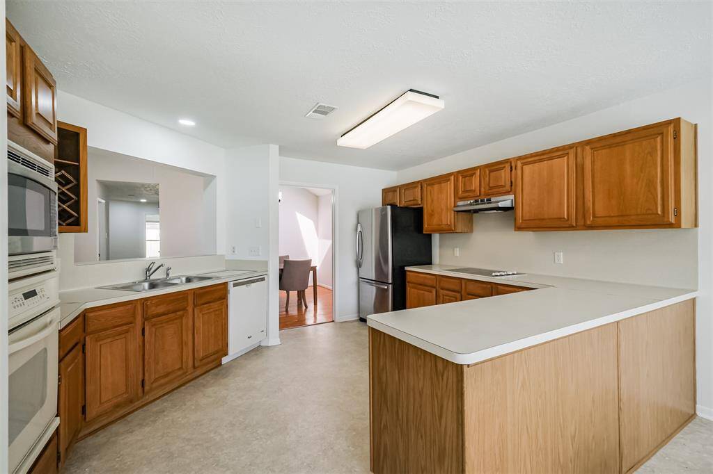 This spacious kitchen has great bones and a wonderful layout
