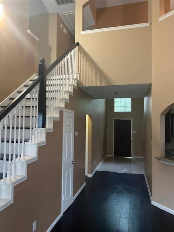 ENTRANCE AND STAIRS VIEW
