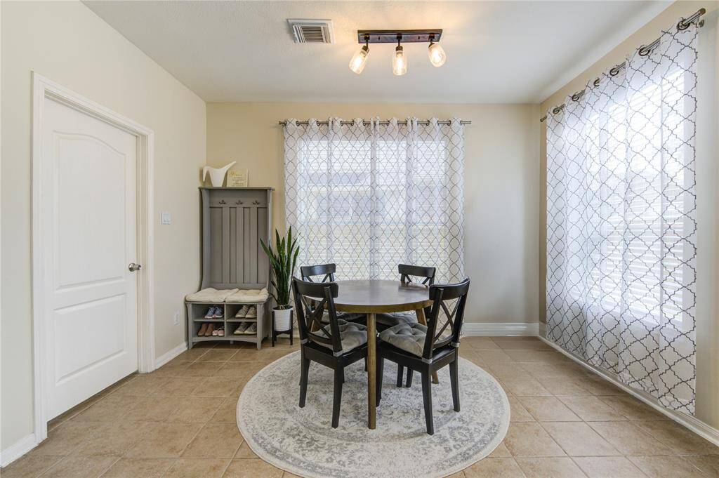 Functional kitchen eat in area.