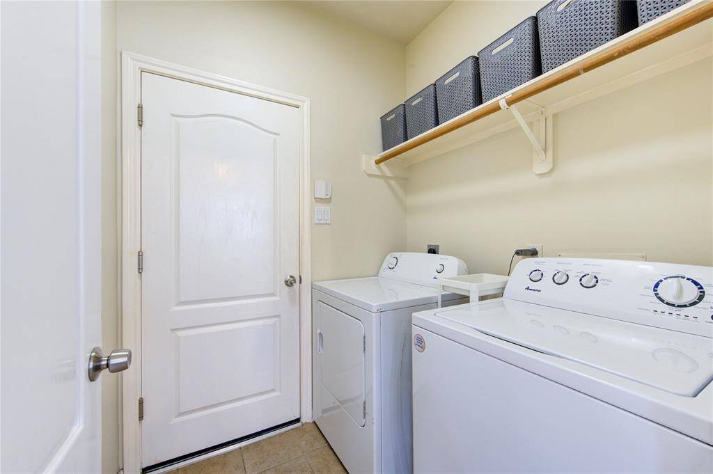 Laundry area comes with full size washer and dryer.