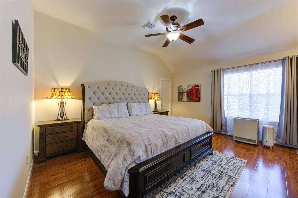 Primary bedroom suite is very spacious includes a sitting area.