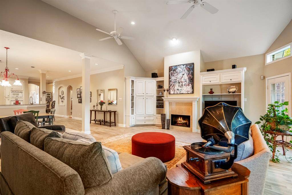 Double ceiling fans and shades accent the space.