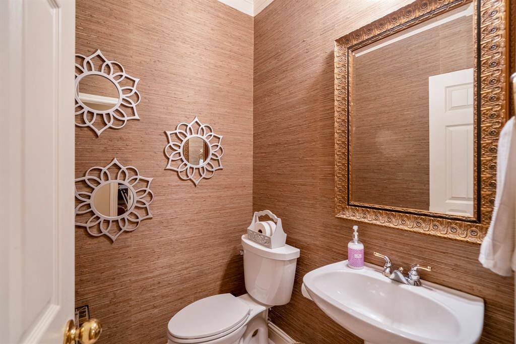 This half bath is located off the kitchen/breakfast area.