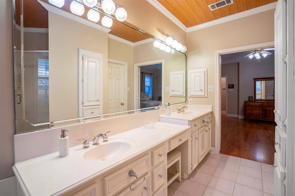 His and hers sinks, and a vanity space as well.