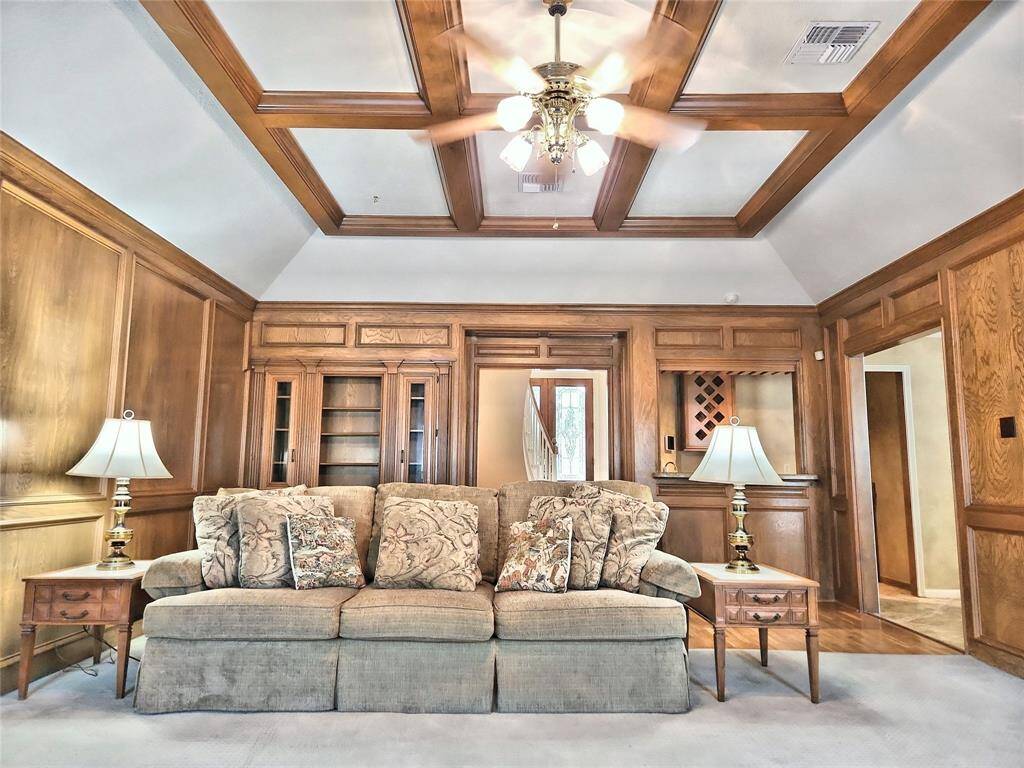 Ample Size Den with 10 ft Hardwood Coffered Ceiling