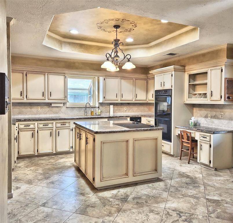Electric Cooktop can be converted to Gas if desired! Coffered Ceiling Design w/ Bay Window View