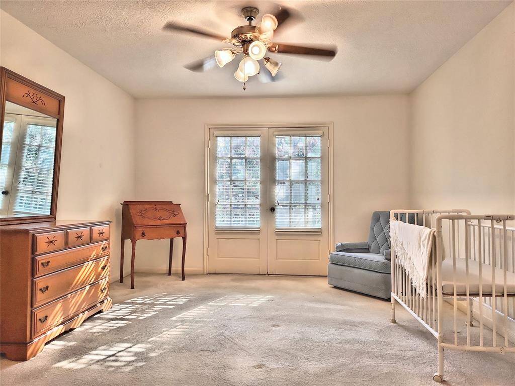 Bedroom w/ Balcony Access