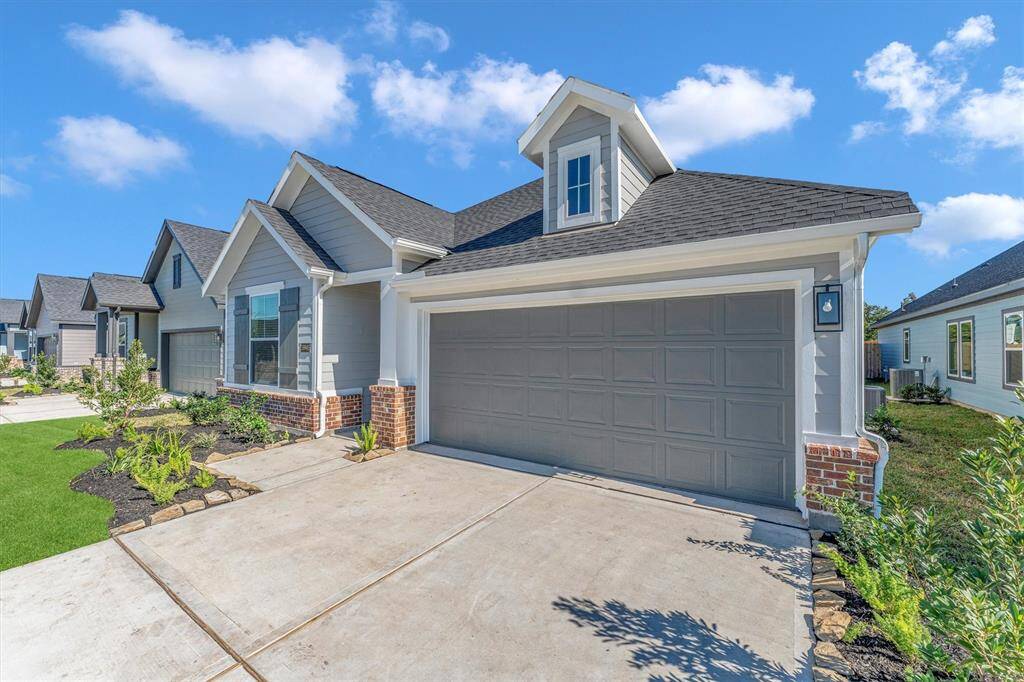 This single-story home has an inviting front porch and fresh landscaping to welcome you home.