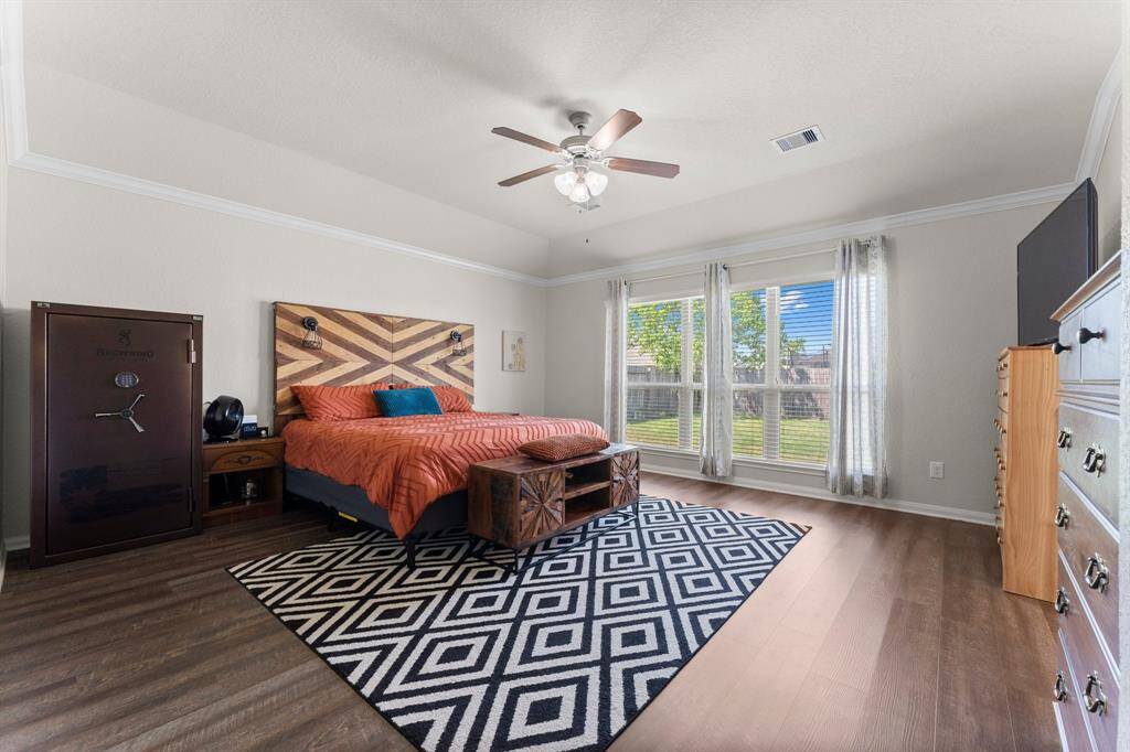 The Primary Bedroom is large at approx 16' x 17', and it overlooks the backyard.