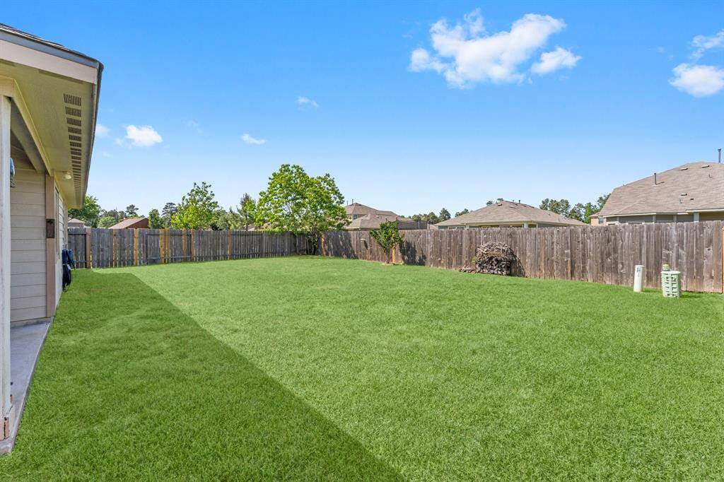 The property runs approx 66' across the back fence. No 2-story home looking down on you either.
