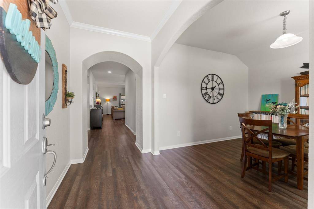 Upon entry, the new luxury vinyl plank (LVP) flooring flows from front to back. No carpet anywhere!