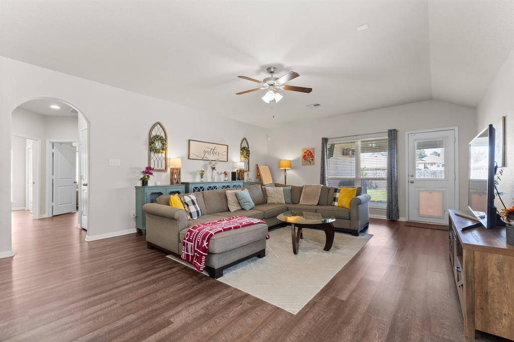 The bedrooms are located through that hallway on the left.