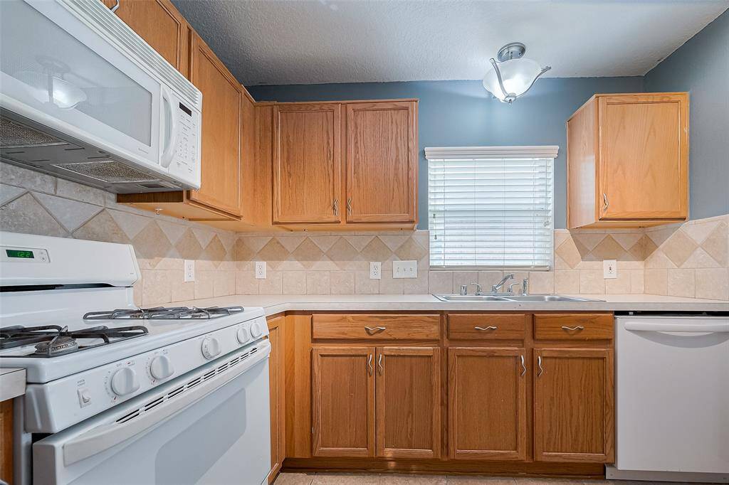 Light and bright kitchen with tons of storage