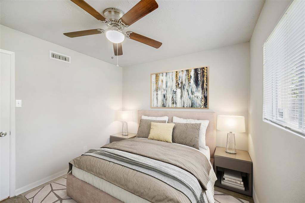 For reference, the secondary bedroom has been virtually staged to showcase its full potential and functionality.