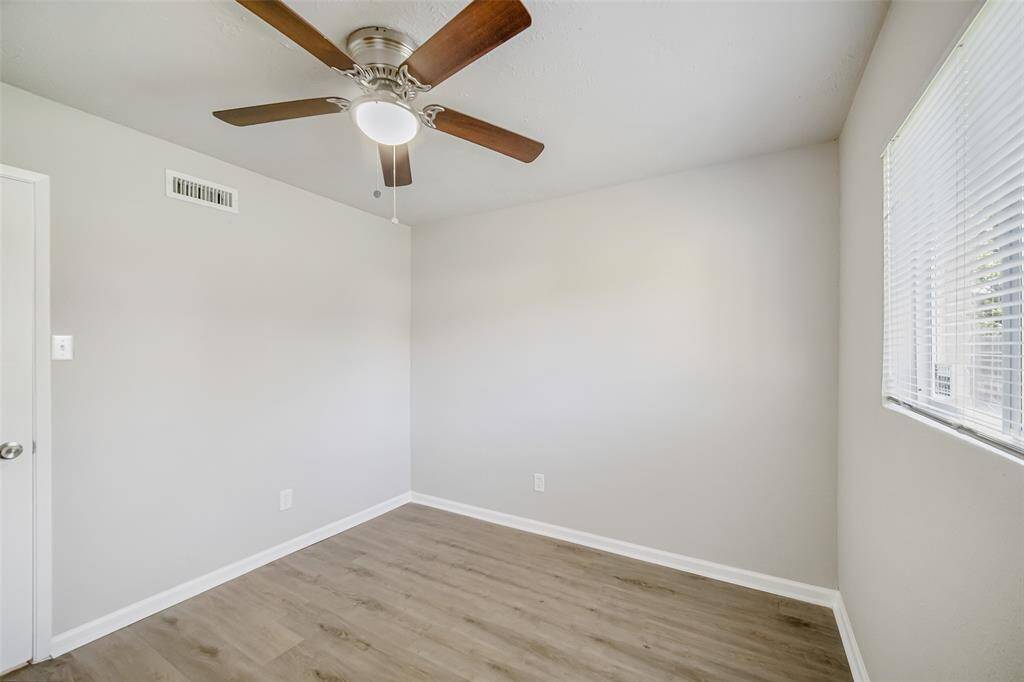 One of two secondary bedrooms.