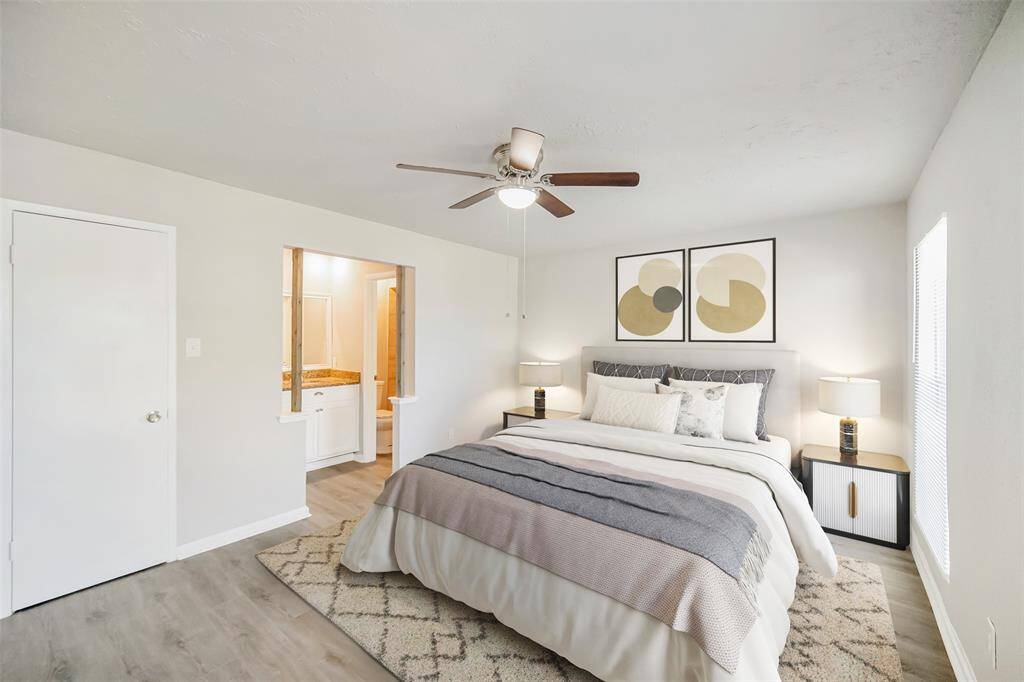 For reference, the primary bedroom has been virtually staged to showcase its full potential and functionality.