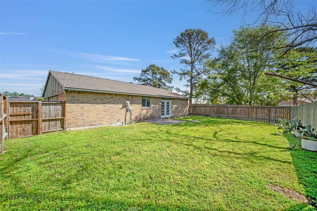 An alternate view of the back of the house provides a fresh perspective of the property.