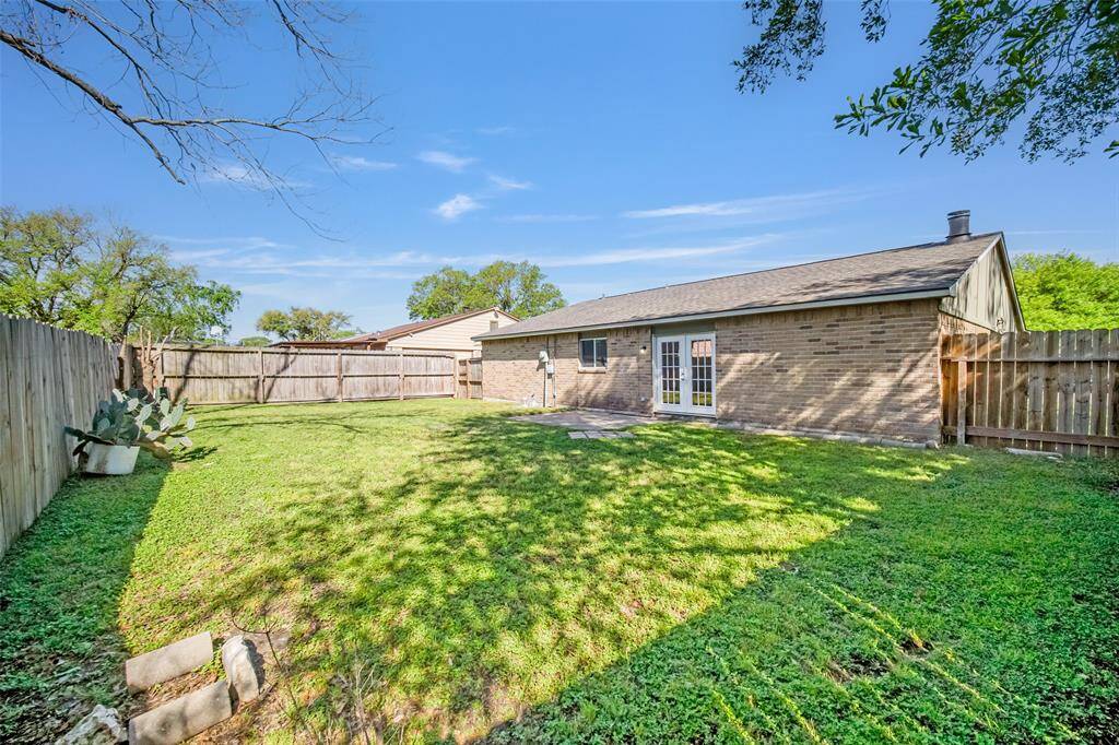 Another alternate view of the back of the house highlights the green space.