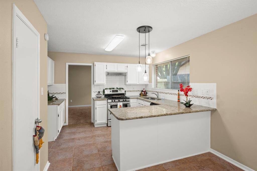 Great storage and counter space anchored with a gas range