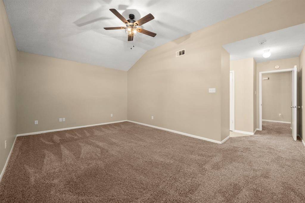 Large primary bedroom with open ensuite to the bath