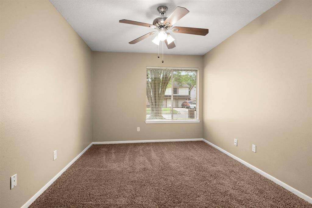 Secondary bedroom facing front elevation of the house