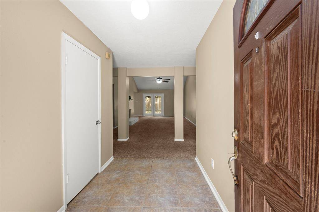 Warm and inviting front tiled entry way