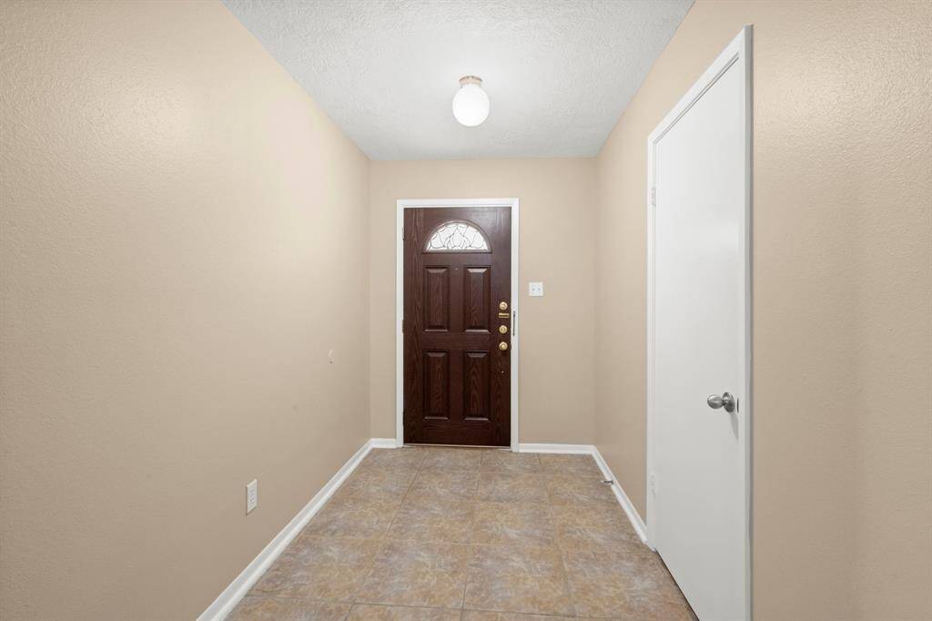 Large entry with extra wide hall ways.