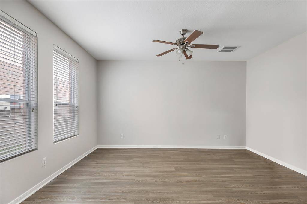 Spacious downstairs primary suite with natural light.  Master bathroom has his and her sinks and large closets.