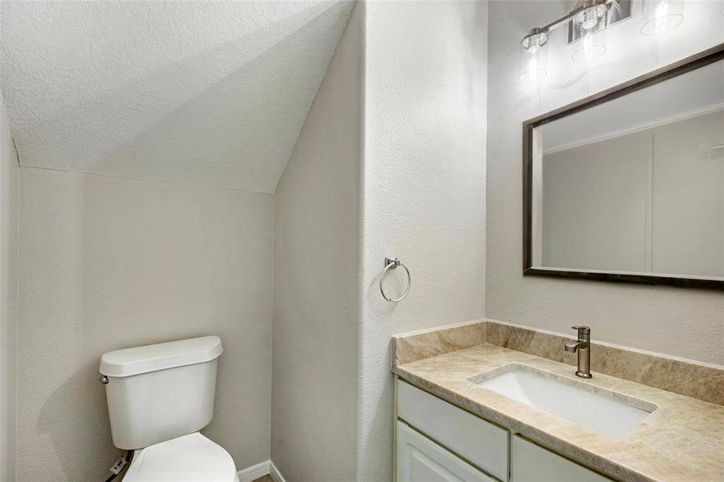 This picture has been Virtually staged:  Downstairs 1/2 bath