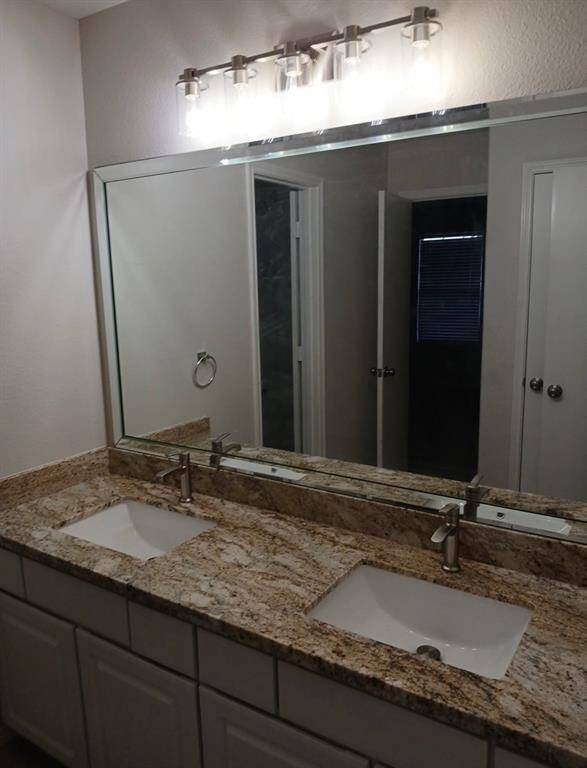 Dual Master bathroom:  New Mirror installed
