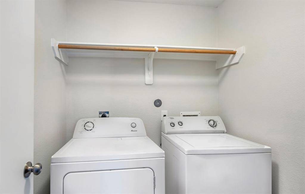 Convenient upstairs laundry, complete with washer & dryer.
