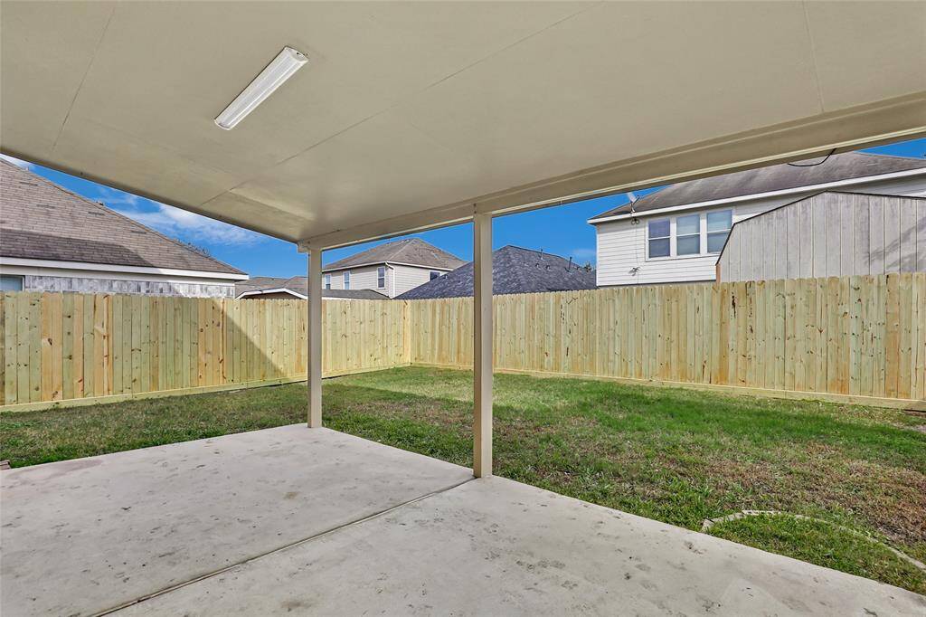 Spacious patio perfect for entertaining or grilling.