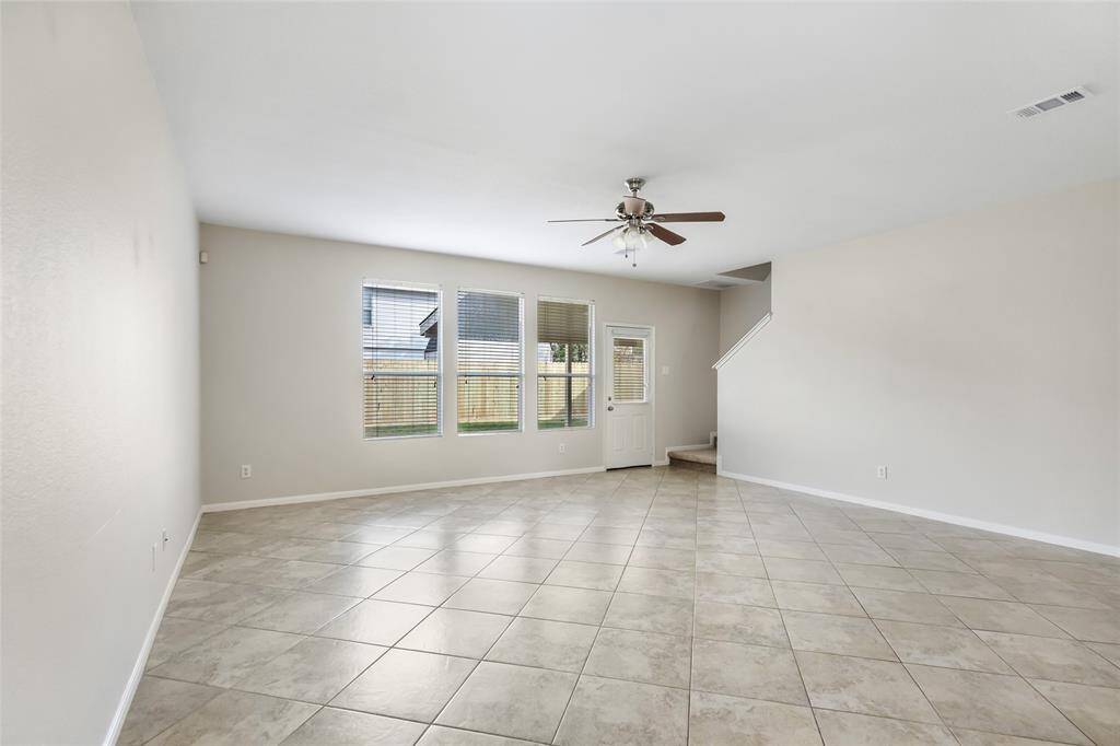 Big Living space with tile flooring and all new paint.  Lots of light and storage.