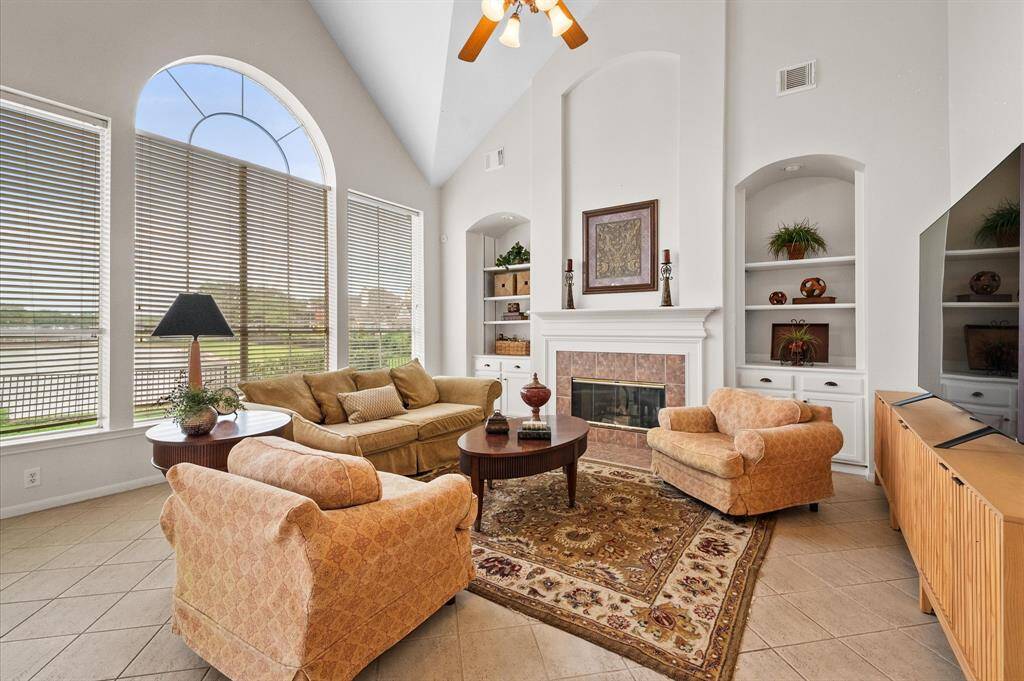The family view is incredibly light and bright with a large arched window facing the water.