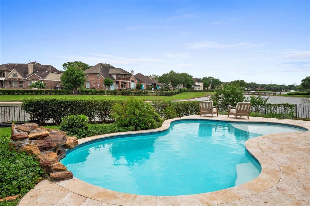 The pool and patio are only three years old. There's a large wading area with umbrella hole. Look at this open view!