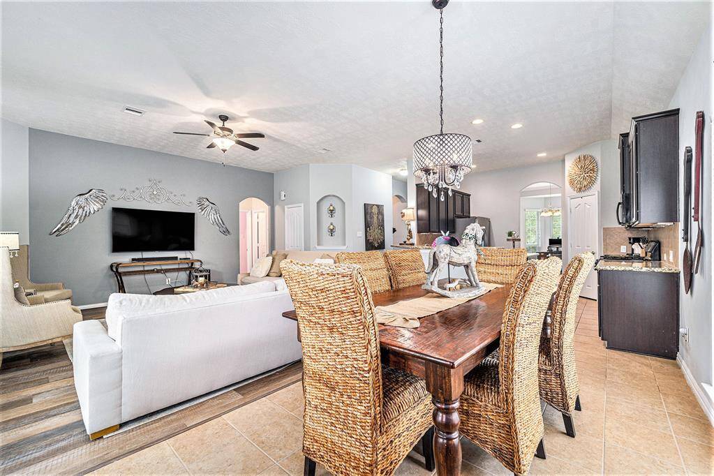 Full view of this open-concept living and kitchen space!